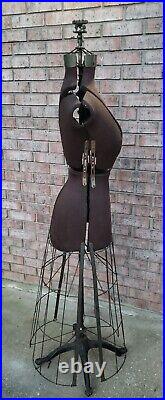 Early 1900's cast iron fully adjustable female dress form/mannequin