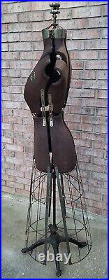 Early 1900's cast iron fully adjustable female dress form/mannequin