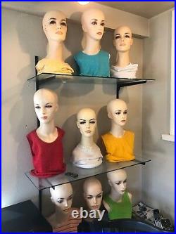 Female mannequin head nine female and one male